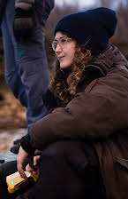 Madeleine Parry som Director