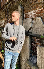 Connor Biddle as Director