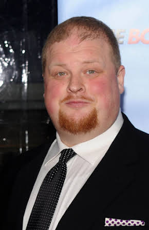 Joel Marsh Garland as 