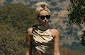 Miley Cyrus racks up millions of views on her 'Flowers' music video.