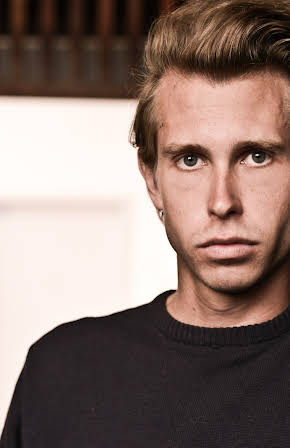 Adam Christie as 