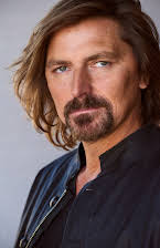 Robin Atkin Downes as 