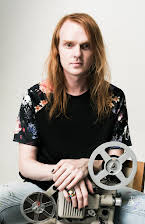 Nicholas Verso as Director