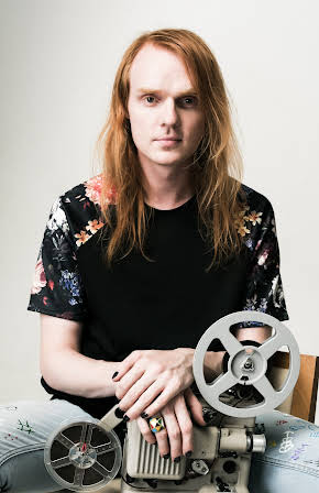 Nicholas Verso as Director