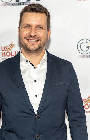 Martin Grof as Director