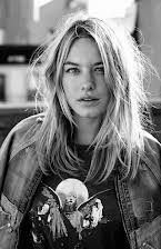 Camille Rowe as 