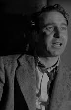 Robert Gist como Det. Leslie Hennessey