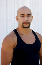 Tim Man som Triad Biker