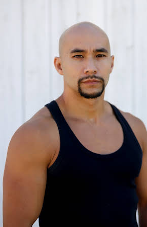 Tim Man as Triad Biker