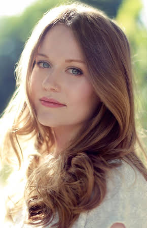 Cara Theobold as 