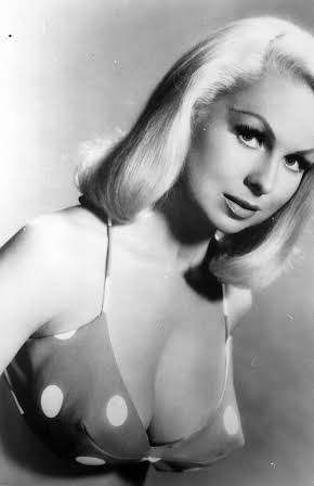 Joi Lansing as 