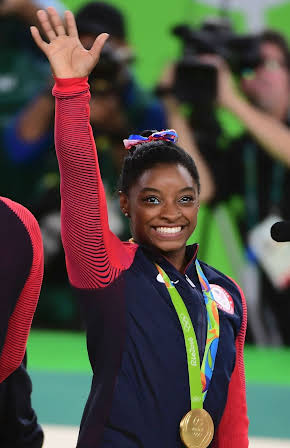 Simone Biles as 