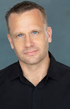 Travis Land as Director