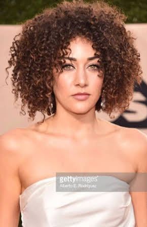 Marielle Scott as 