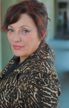 Sharon Angela as Dina