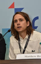 Matthew Brown som Director