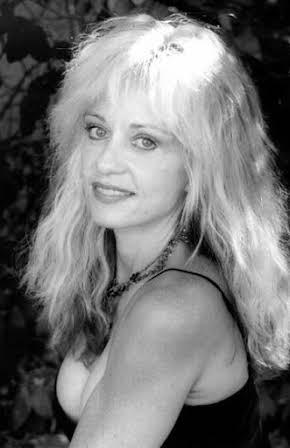 Linnea Quigley as 