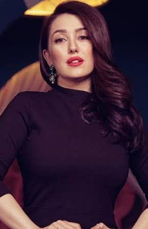 Kinda Alloush as 