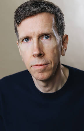 Robert Stanton as 