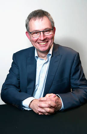 Roger Mainwood as Director