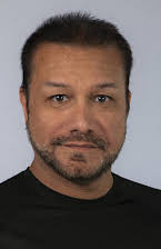 Amir Valinia as Director