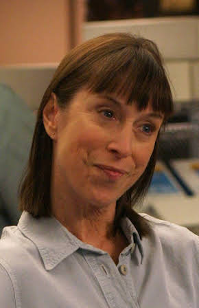 Valerie Curtin as Director