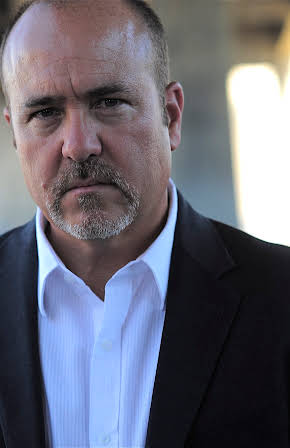 Michael Emanuel as Director