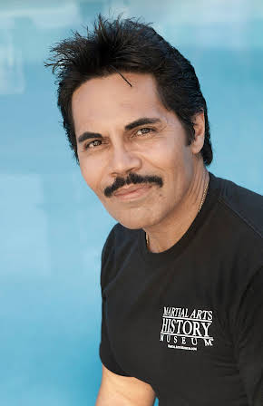 Art Camacho as Director