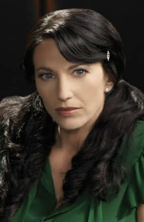 Claudia Black as 