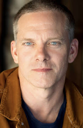 Adam John Harrington as 