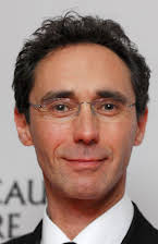 Guy Henry as 