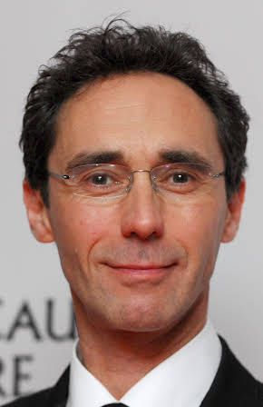Guy Henry as 
