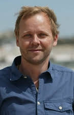 Tomas Villum Jensen som Director