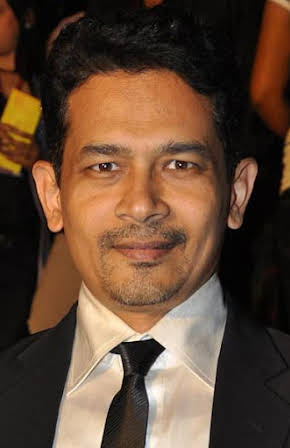 Atul Kulkarni as 