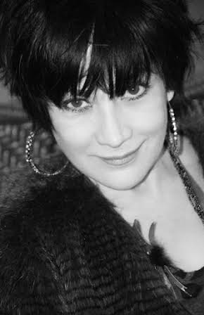 Dyana Ortelli as 
