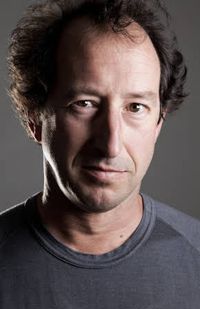 Adam Neill as 