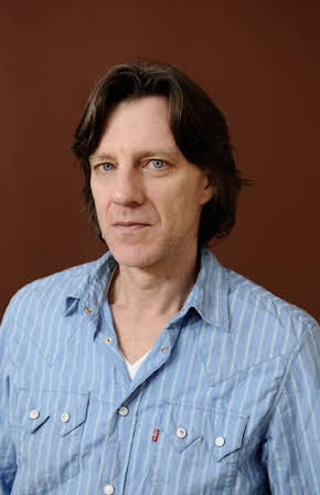 James Marsh as Director