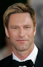 Aaron Eckhart as 