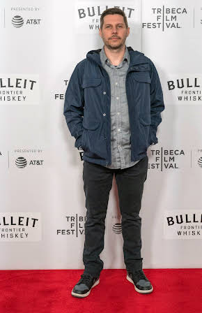 Brett Whitcomb as Director