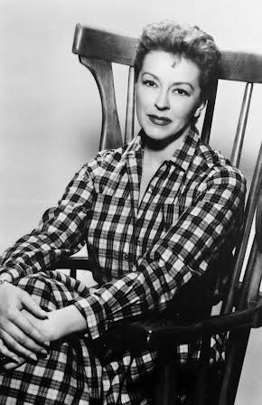 Nancy Kelly as Director