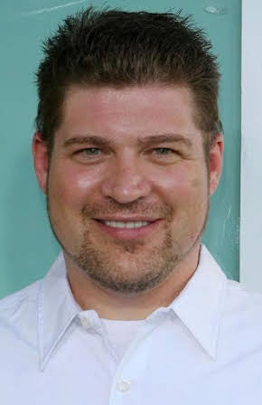 Brad William Henke as 