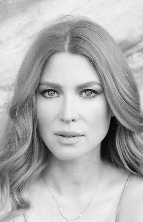 Emma Booth as 