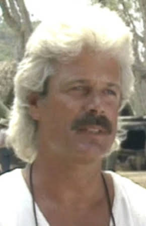 Craig R. Baxley as Director