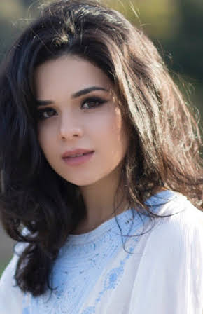 Gabriela Flores as 