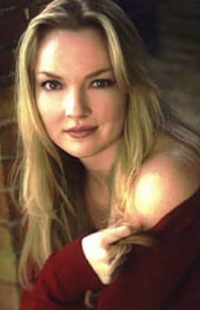 Angela Vint as 