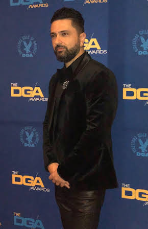 Ali Zamani as Director
