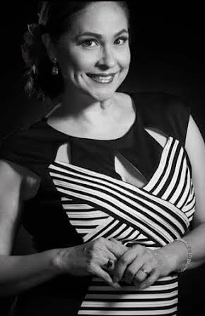 Joyce Ann Burton as 