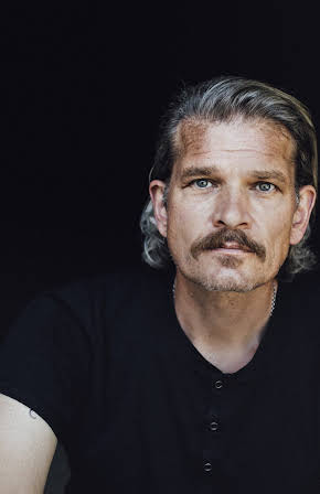 Götz Otto as 