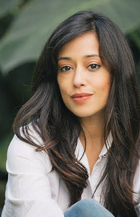 Elena Hurst as 