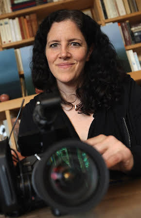 Laura Poitras as 